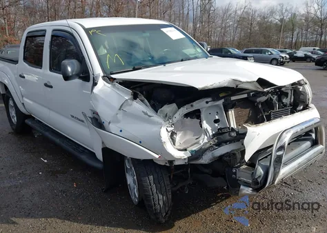 2015 Toyota Tacoma Base V6 z USA, uszkodzony, nr VIN 3TMLU4ENXFM207224